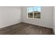 Bedroom featuring a large window providing plenty of natural light at 10557 Sw 98Th Ln, Ocala, FL 34481