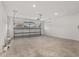 Spacious garage with a large door providing ample space for parking and storage at 10557 Sw 98Th Ln, Ocala, FL 34481