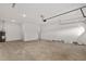 A bright and spacious garage with smooth concrete floor, ready for parking and storage at 10557 Sw 98Th Ln, Ocala, FL 34481