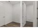 Hallway leading to additional rooms and luxury vinyl flooring at 10557 Sw 98Th Ln, Ocala, FL 34481