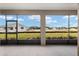 View from the lanai with large windows to enjoy the beautiful views and outdoor living at 10557 Sw 98Th Ln, Ocala, FL 34481