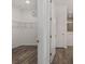 Walk-in closet with a door leading to the bathroom at 10557 Sw 98Th Ln, Ocala, FL 34481