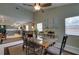 The dining room offers great natural light and transitions seamlessly to the kitchen at 11720 Cherokee Cir, Dunnellon, FL 34431