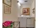 Clean laundry room featuring a standard washer and dryer and floral decorations at 11720 Cherokee Cir, Dunnellon, FL 34431