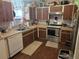 Functional kitchen with modern appliances and ample counter space at 11860 Nw 18Th Pl, Ocala, FL 34482