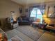 Inviting living room with comfortable seating, decor, and natural light at 11860 Nw 18Th Pl, Ocala, FL 34482