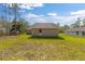 Spacious backyard with new home and large grassy area at 127 Sw Alvarez Rd, Dunnellon, FL 34431