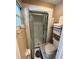 Bathroom featuring a tiled shower with glass door at 19726 Sw 95Th St, Dunnellon, FL 34432