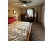 Bedroom with neutral carpet and a large window at 19726 Sw 95Th St, Dunnellon, FL 34432