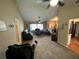 Open-concept living room with vaulted ceilings and comfortable seating at 19726 Sw 95Th St, Dunnellon, FL 34432