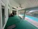 Enjoy the poolside lanai for relaxation and shade near the pool at 19726 Sw 95Th St, Dunnellon, FL 34432