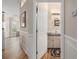 A charming bathroom with a granite countertop, framed mirror, and modern lighting at 2318 Nw 50Th Ave, Ocala, FL 34482