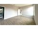 Bedroom with wood-look tile flooring and ample natural light coming through a window at 3085 Sw 131St Place Rd, Ocala, FL 34473