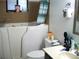 Well lit bathroom with a seated bathtub and modern sink with large mirror at 409 Marion Oaks Dr, Ocala, FL 34473