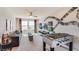 Spacious game room featuring a foosball table, media center, comfortable seating, and ample space at 4266 Sw 53Rd Lane Rd, Ocala, FL 34474