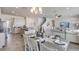 Open-concept living space with a modern kitchen, dining area, living room, and elegant decor throughout at 4266 Sw 53Rd Lane Rd, Ocala, FL 34474