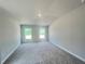Large, bright bedroom with vaulted ceilings, plush carpeting and ample natural light at 4381 Sw 90Th Pl, Ocala, FL 34476