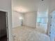 Spacious living room featuring recessed lighting and tile flooring open to the kitchen at 4381 Sw 90Th Pl, Ocala, FL 34476