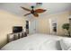 Well-lit bedroom with wood floors, ceiling fan and closet at 4425 Se 2Nd Pl, Ocala, FL 34471