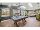 Game room featuring a pool table, ample natural light, and plants at 4425 Se 2Nd Pl, Ocala, FL 34471