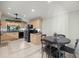 Kitchen features a breakfast nook, black appliances, and tiled floors at 4425 Se 2Nd Pl, Ocala, FL 34471