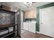 Laundry room with washer, dryer, and plenty of cabinets for storage at 4425 Se 2Nd Pl, Ocala, FL 34471