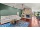 Bright living room featuring a stone fireplace, hardwood floors, and an open layout at 4425 Se 2Nd Pl, Ocala, FL 34471