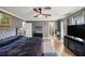Spacious main bedroom features hardwood floors, modern decor, and ensuite bathroom at 4425 Se 2Nd Pl, Ocala, FL 34471