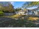 Expansive backyard with lush green grass perfect for outdoor activities and relaxation at 53 Juniper Trail Cir, Ocala, FL 34480