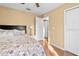 Cozy bedroom featuring a comfortable bed and neutral walls at 53 Juniper Trail Cir, Ocala, FL 34480