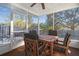 Screened patio provides an idyllic setting for outdoor dining and entertaining at 53 Juniper Trail Cir, Ocala, FL 34480
