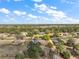 Overhead picture of home on a large lot with mature trees and landscaping at 5926 Ne 62Nd Court Rd, Silver Springs, FL 34488