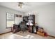 Bedroom featuring a built-in desk area with drawers, shelving, and ample natural light at 5926 Ne 62Nd Court Rd, Silver Springs, FL 34488