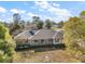 Lovely single-story house with a well-maintained lawn and mature trees at 5926 Ne 62Nd Court Rd, Silver Springs, FL 34488