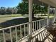 Cozy front porch view with seating at 5926 Ne 62Nd Court Rd, Silver Springs, FL 34488