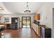 View of kitchen features brick flooring, stainless steel appliances, and plenty of counter space at 5926 Ne 62Nd Court Rd, Silver Springs, FL 34488