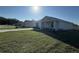 Charming single-story home with a well-manicured lawn, a concrete driveway, and a welcoming front porch at 6620 Se 108Th Ln, Belleview, FL 34420