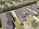Aerial view of a well-maintained home, featuring a new roof, landscaping and ample yard space at 7234 Sw 91St Ct, Ocala, FL 34481