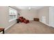 Expansive bedroom with comfortable seating, natural light, and plenty of open space at 7234 Sw 91St Ct, Ocala, FL 34481
