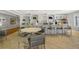 Resident lounge with a well-equipped bar, countertop seating, and stylish decor at 7234 Sw 91St Ct, Ocala, FL 34481