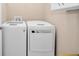 Convenient laundry room features a modern washer and dryer at 7234 Sw 91St Ct, Ocala, FL 34481