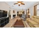 Comfortable living room features tiled flooring and an open concept design at 7234 Sw 91St Ct, Ocala, FL 34481