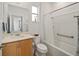 Cozy bathroom featuring a tub and shower combination, neutral decor and sink at 7935 Sw 89Th Ter, Ocala, FL 34481