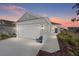 Charming single-Gathering home with a two-car garage, accent lighting, and meticulous landscaping at 7935 Sw 89Th Ter, Ocala, FL 34481