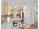 Bright kitchen featuring granite countertops, stainless steel appliances, and light wood cabinets at 7935 Sw 89Th Ter, Ocala, FL 34481