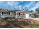 Charming single-story home features manicured landscaping and a welcoming front porch at 8665 Sw 94Th Ln # C, Ocala, FL 34481