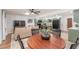 Open-concept living area with a modern kitchen, comfortable seating, and a stylish dining space at 8665 Sw 94Th Ln # C, Ocala, FL 34481