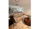 Cozy living room featuring a comfortable sofa and stylish round coffee table at 8665 Sw 94Th Ln # C, Ocala, FL 34481