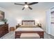 Comfortable main bedroom with a ceiling fan and soft natural light at 8665 Sw 94Th Ln # C, Ocala, FL 34481