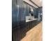 Stainless appliances and sleek cabinetry are featured in this home's gorgeous modern kitchen at 8825 Sw 57Th Place Rd, Ocala, FL 34481